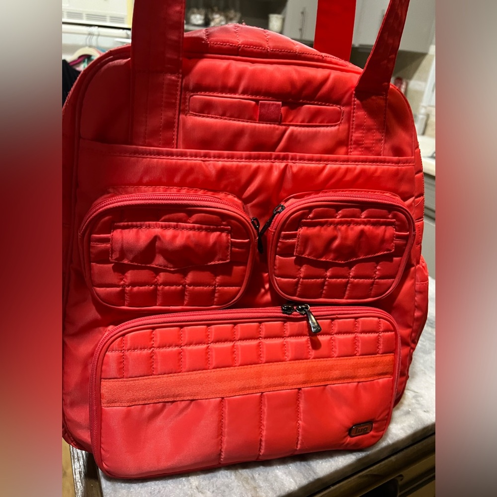 Lug Bright Coral “Puddle Jumper”.